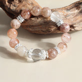 Elegant gemstone bracelet featuring Red Rutilated Quartz and Moonstone, designed for intuition and clarity.